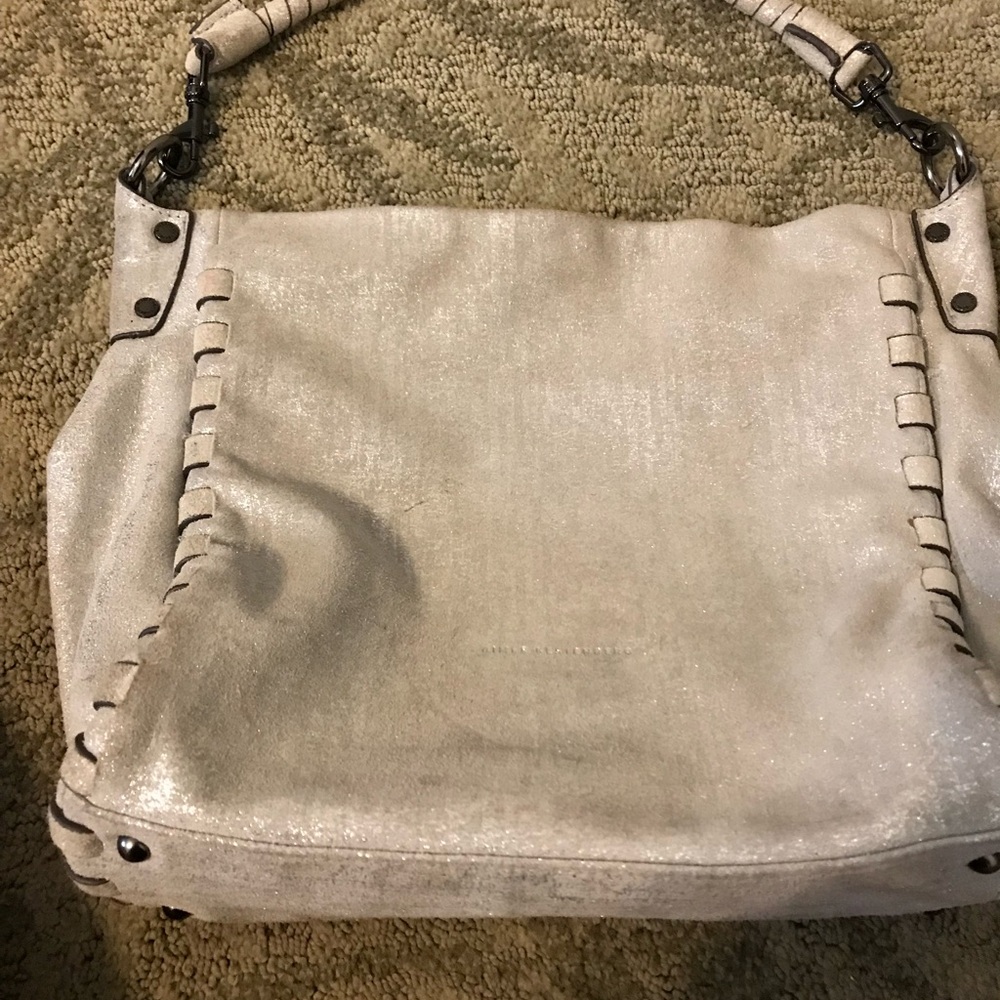 Silver Amy Kestenberg slouchy purse.